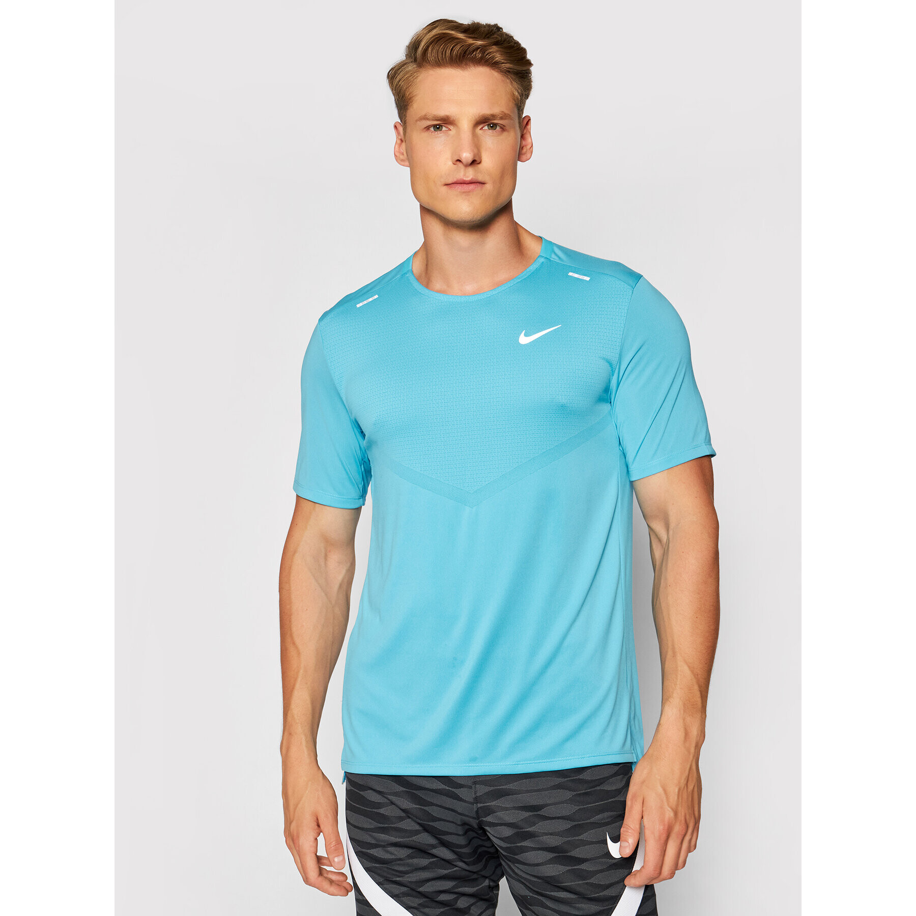 Nike Тениска от техническо трико Dri-Fit Rise CZ9184 Син Standard Fit - Pepit.bg