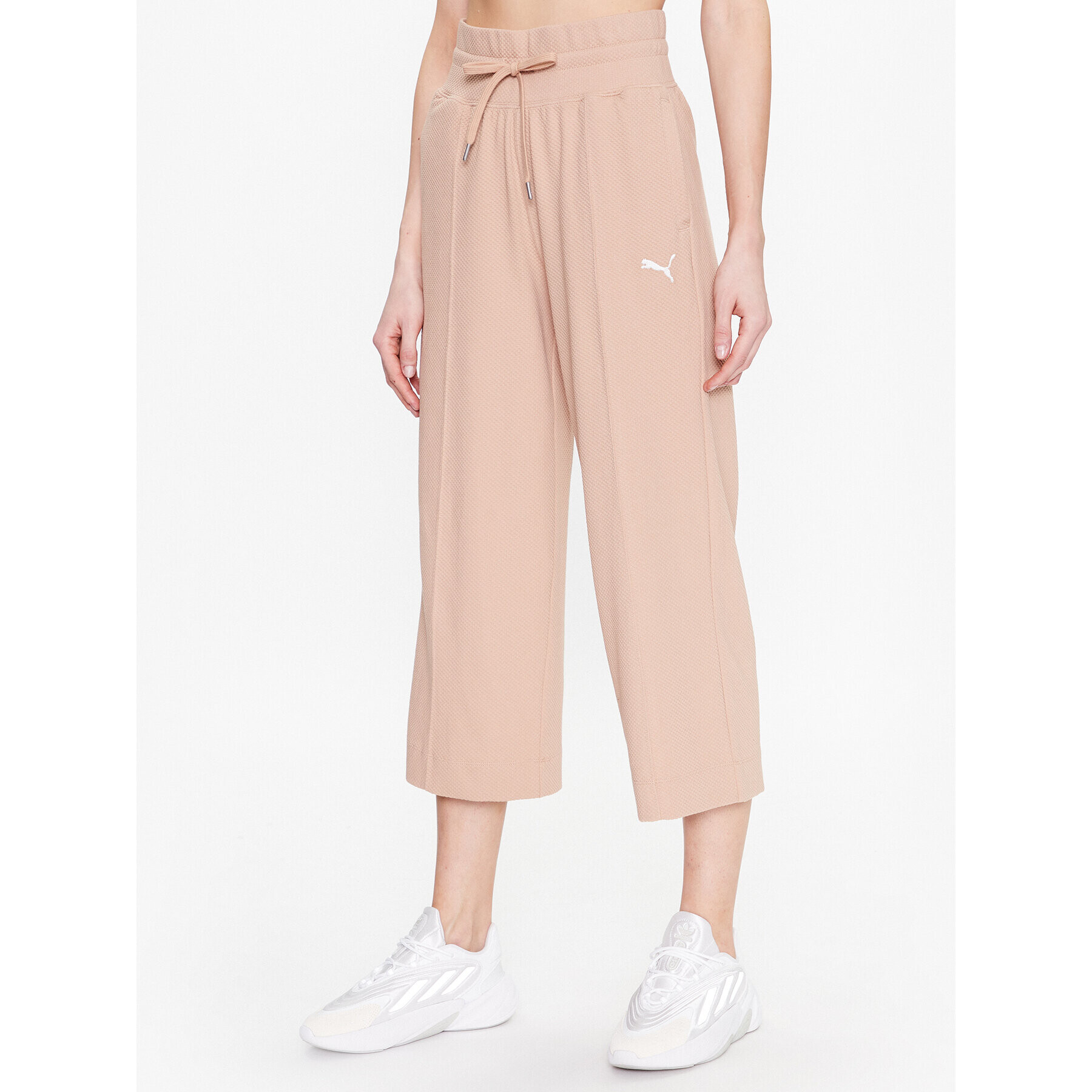 Puma Долнище анцуг Her 673113 Бежов Relaxed Fit - Pepit.bg