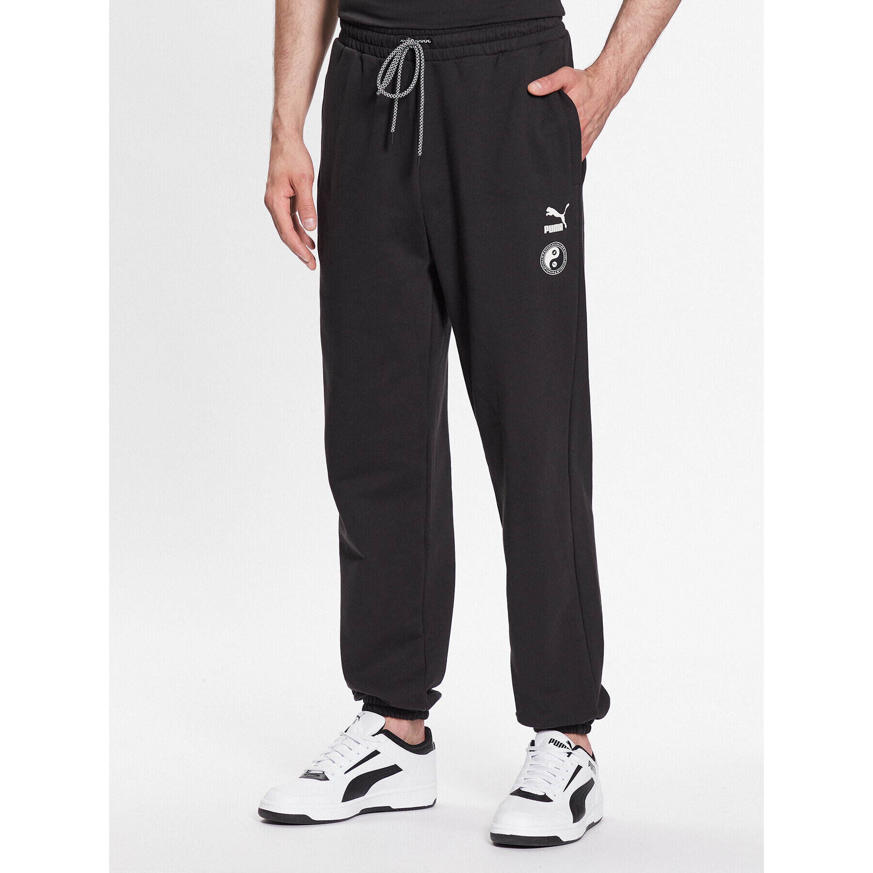 Puma Долнище анцуг STAPLE 539827 Черен Relaxed Fit - Pepit.bg