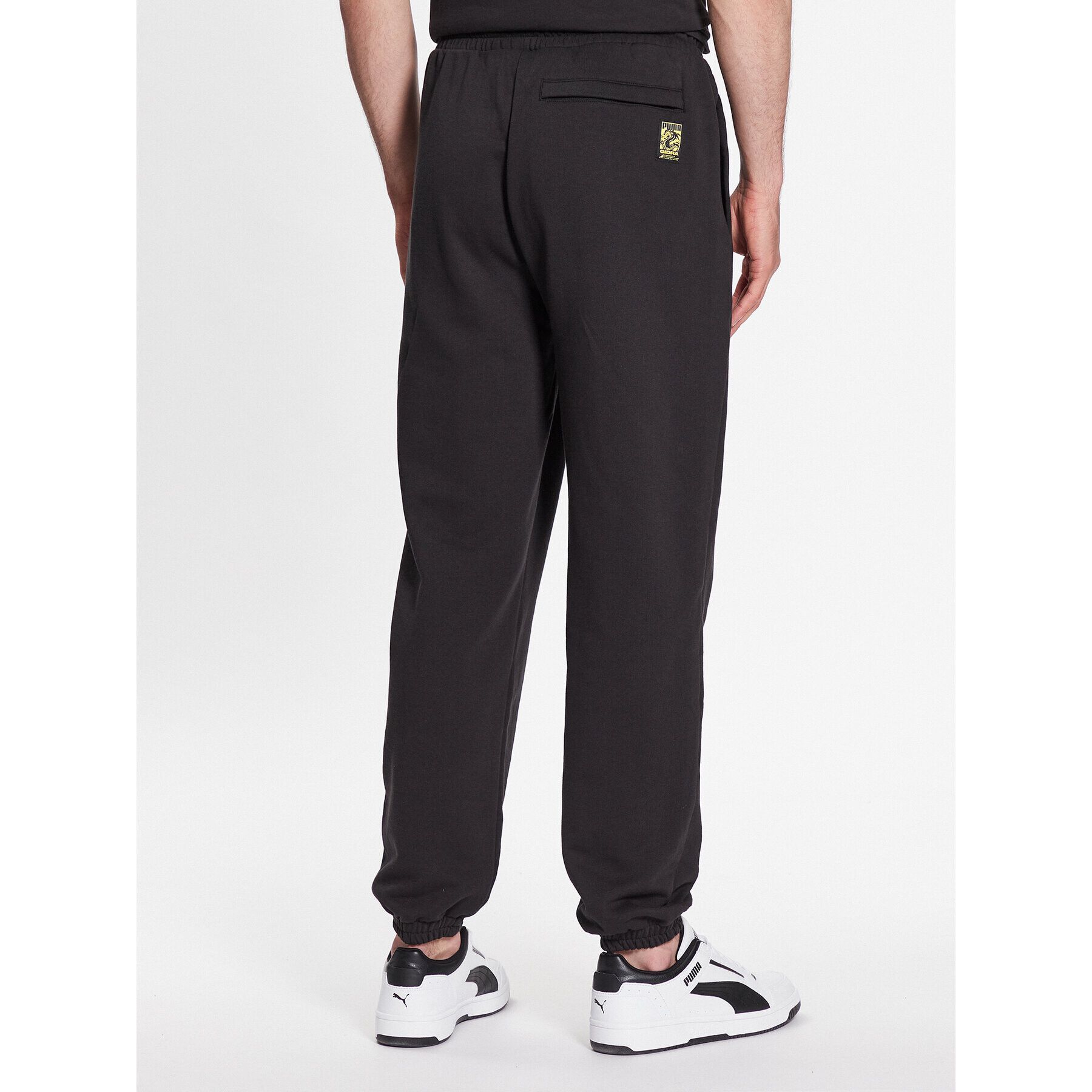 Puma Долнище анцуг STAPLE 539827 Черен Relaxed Fit - Pepit.bg