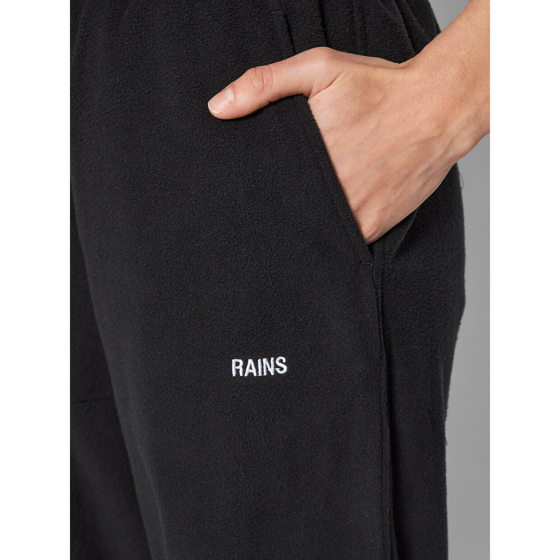 Rains Долнище анцуг Unisex 18660 Черен Regular Fit - Pepit.bg