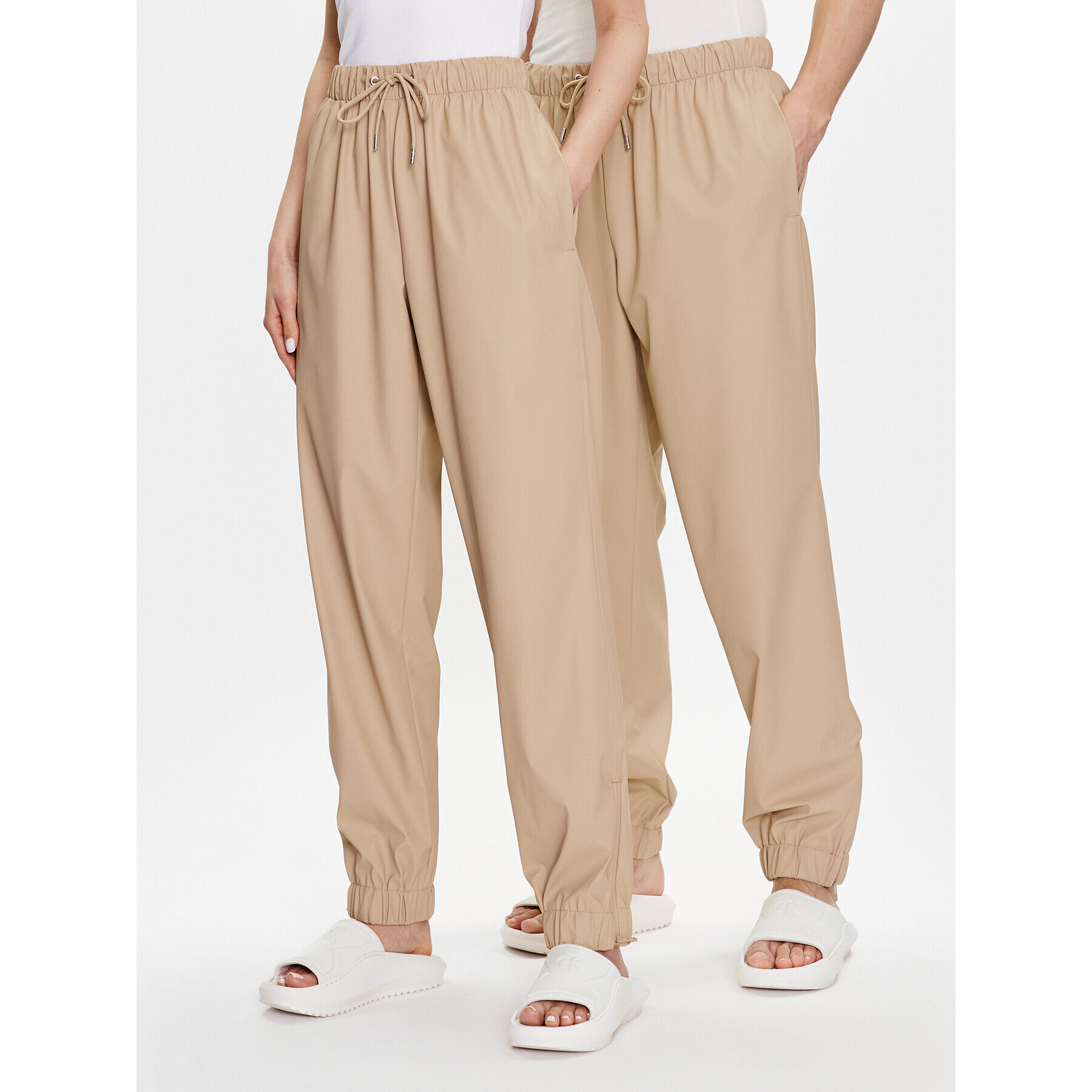 Rains Текстилни панталони Unisex 18560 Бежов Comfortable Fit - Pepit.bg