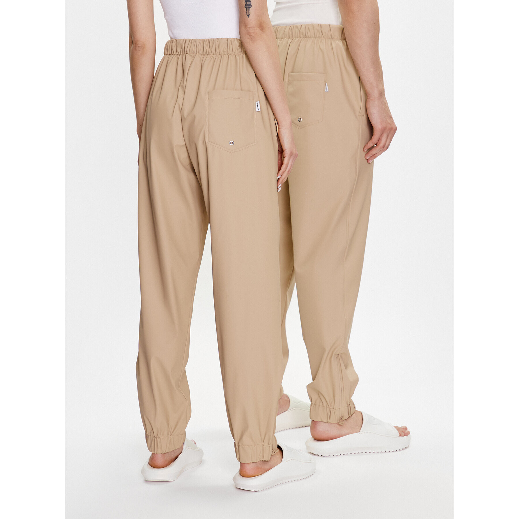 Rains Текстилни панталони Unisex 18560 Бежов Comfortable Fit - Pepit.bg