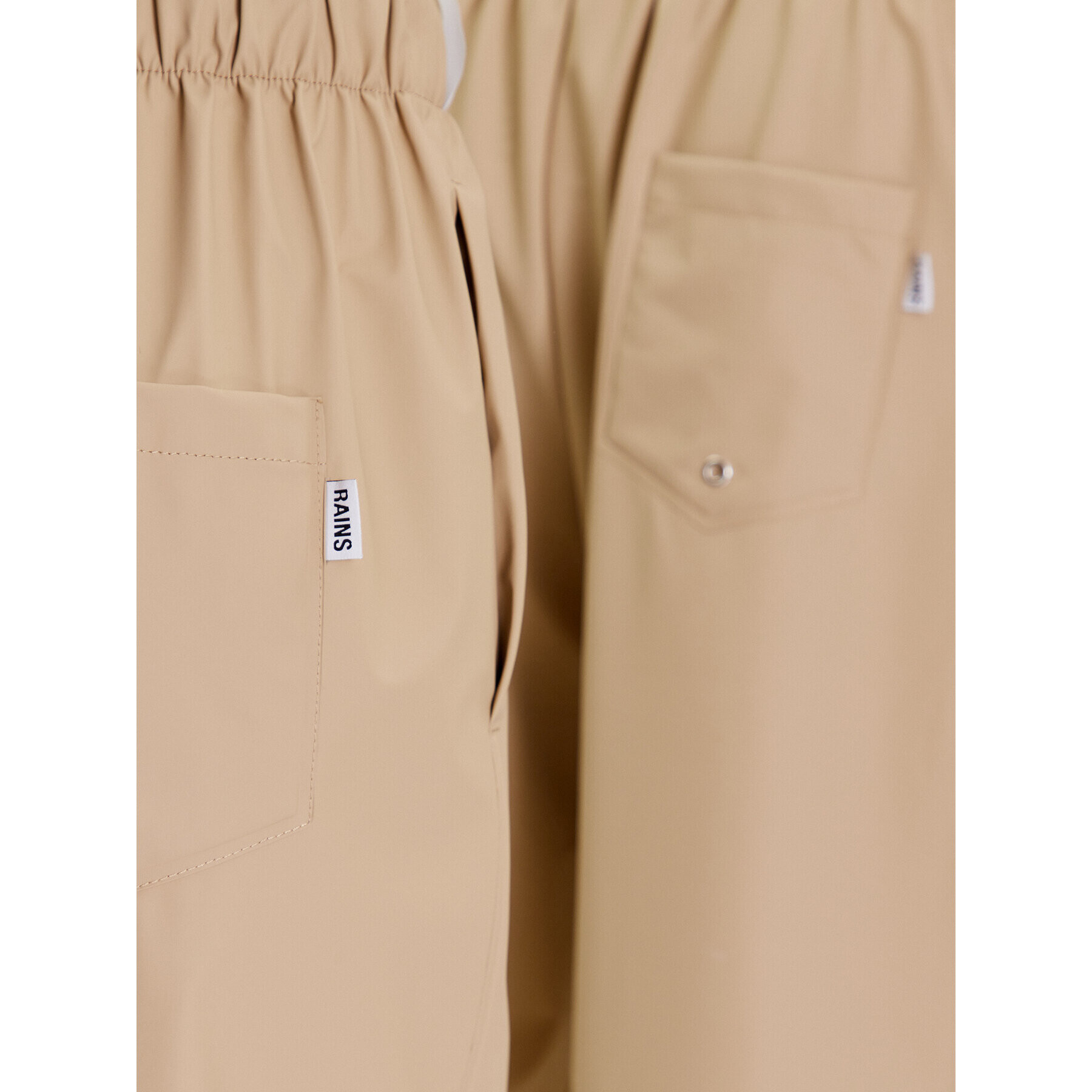 Rains Текстилни панталони Unisex 18560 Бежов Comfortable Fit - Pepit.bg