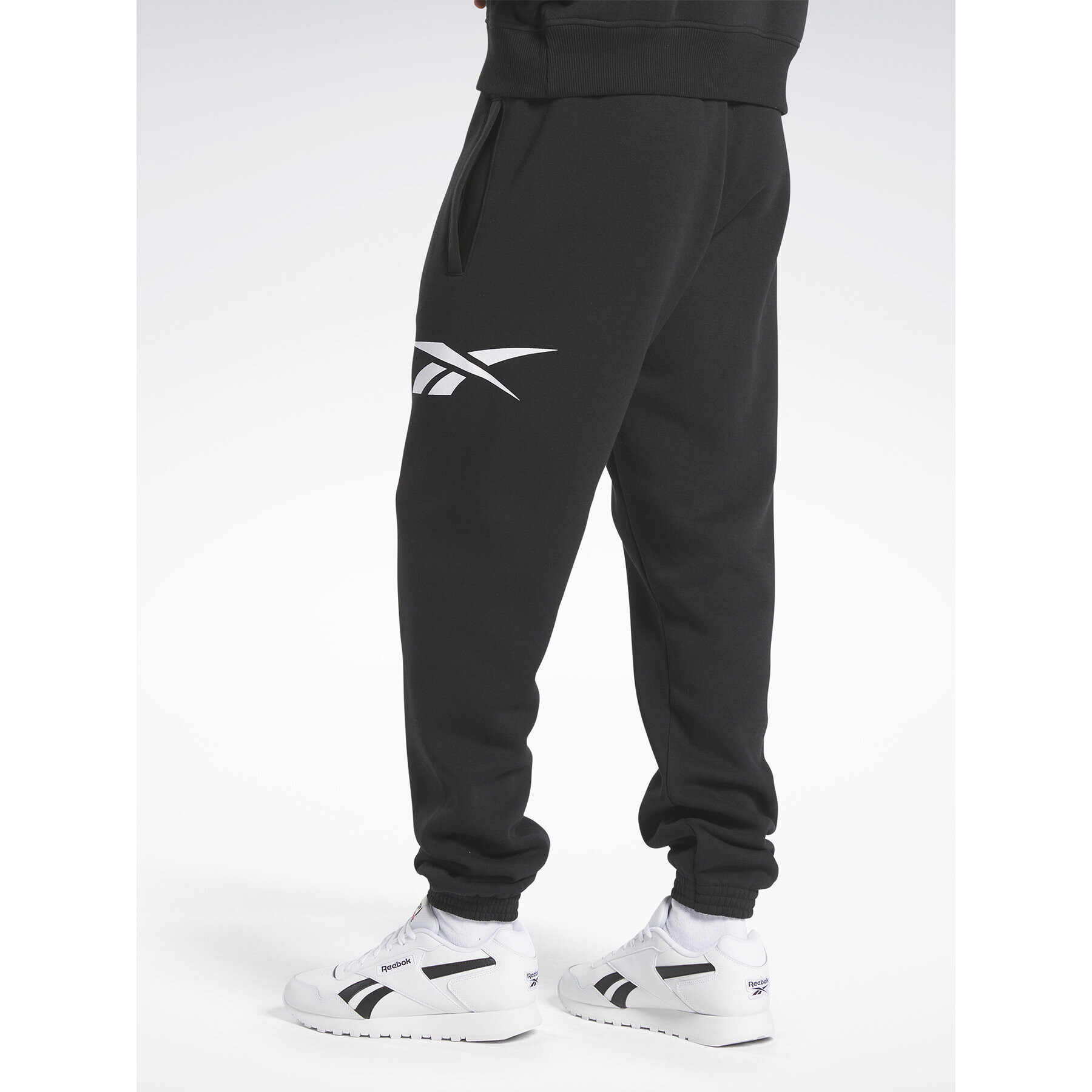 Reebok Долнище анцуг Classics Brand Proud HY7107 Черен Regular Fit - Pepit.bg