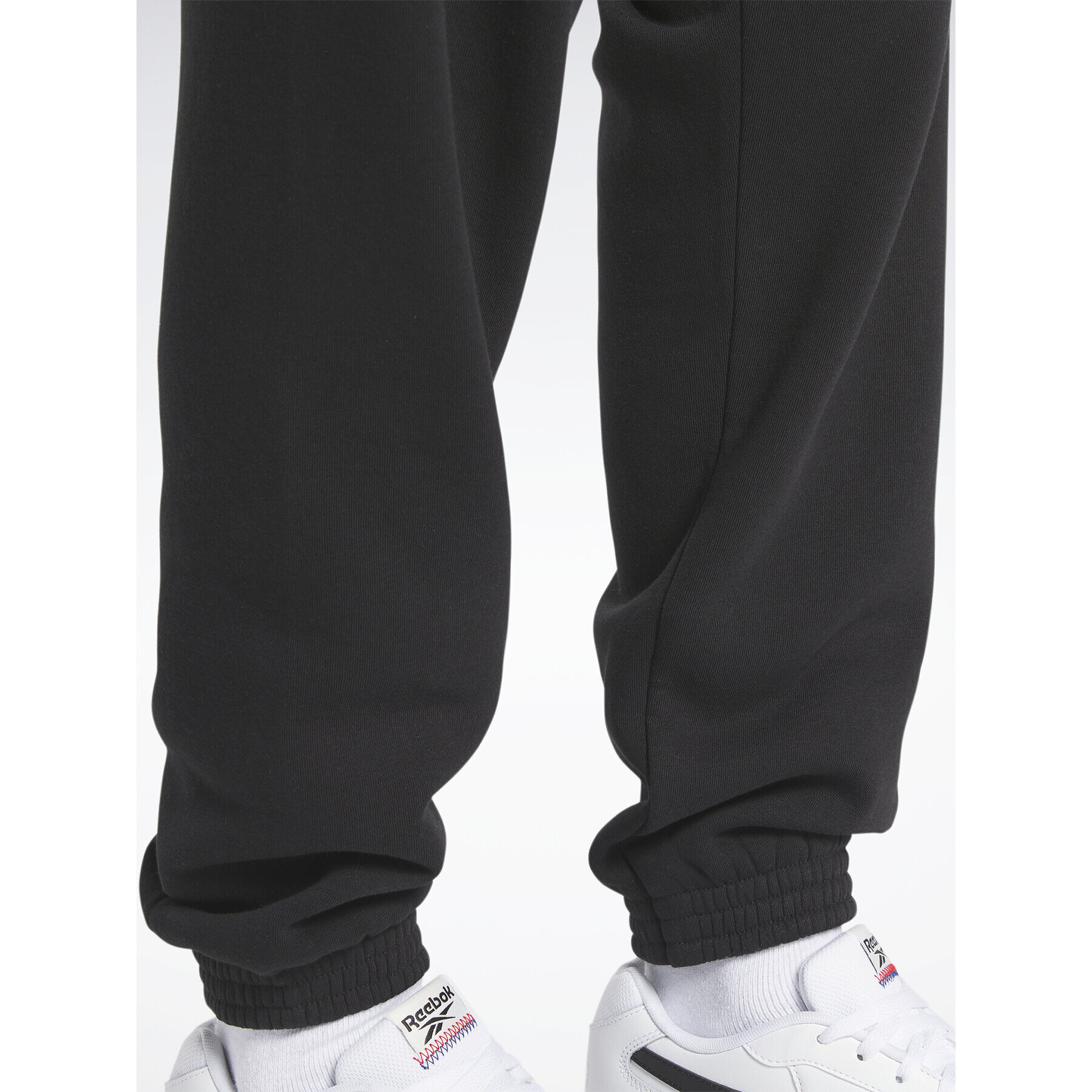 Reebok Долнище анцуг Classics Brand Proud HY7107 Черен Regular Fit - Pepit.bg