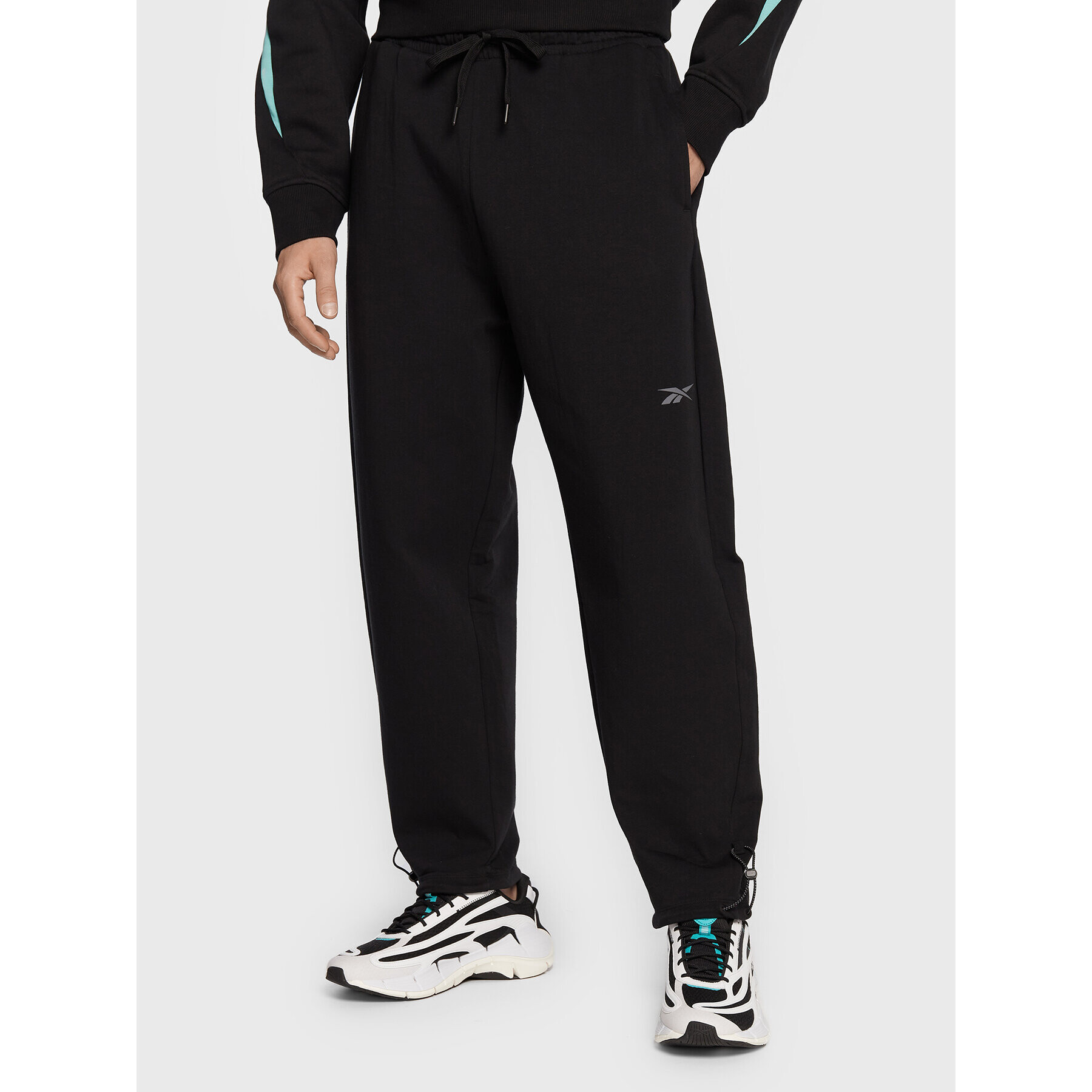 Reebok Долнище анцуг DreamBlend HG8906 Черен Loose Fit - Pepit.bg