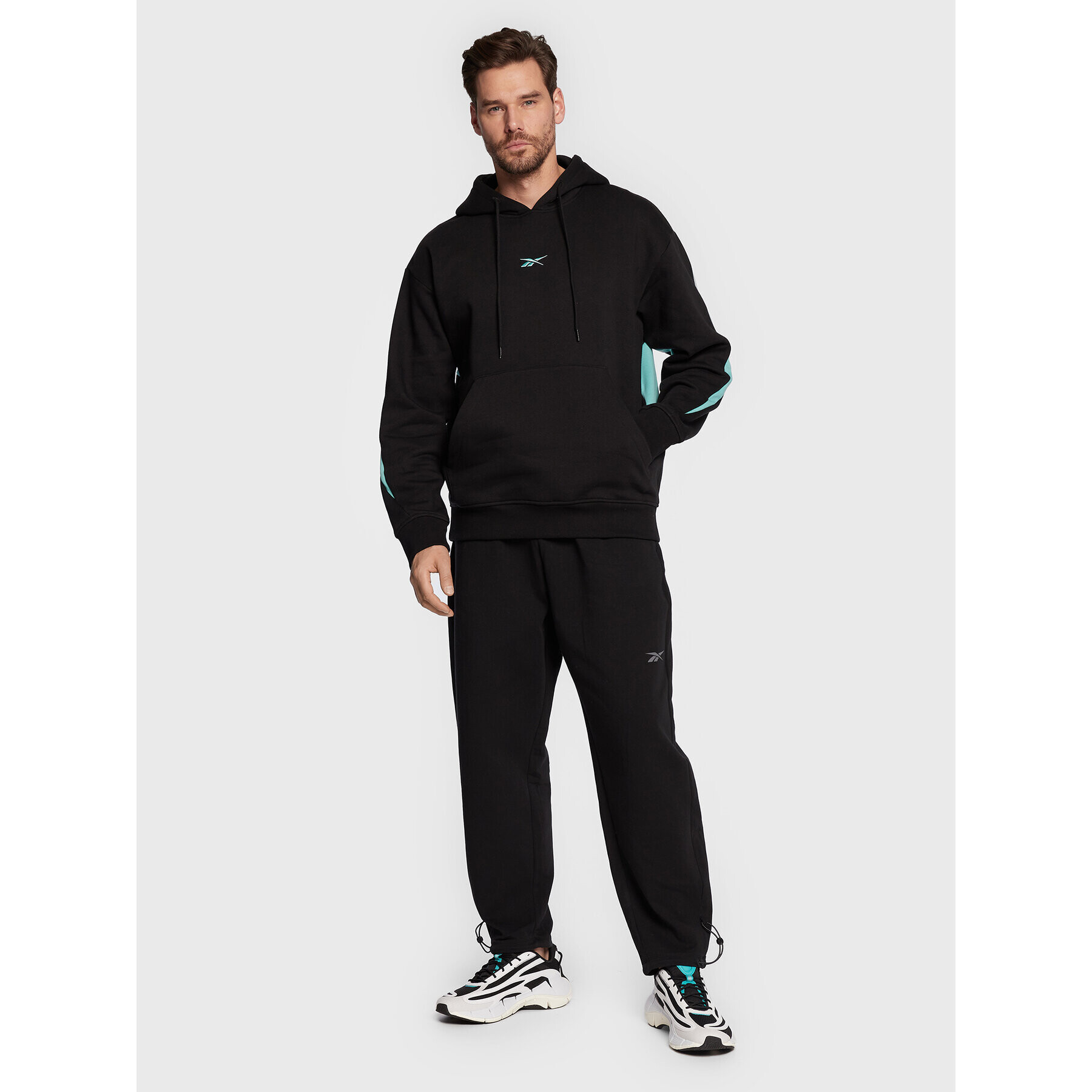 Reebok Долнище анцуг DreamBlend HG8906 Черен Loose Fit - Pepit.bg