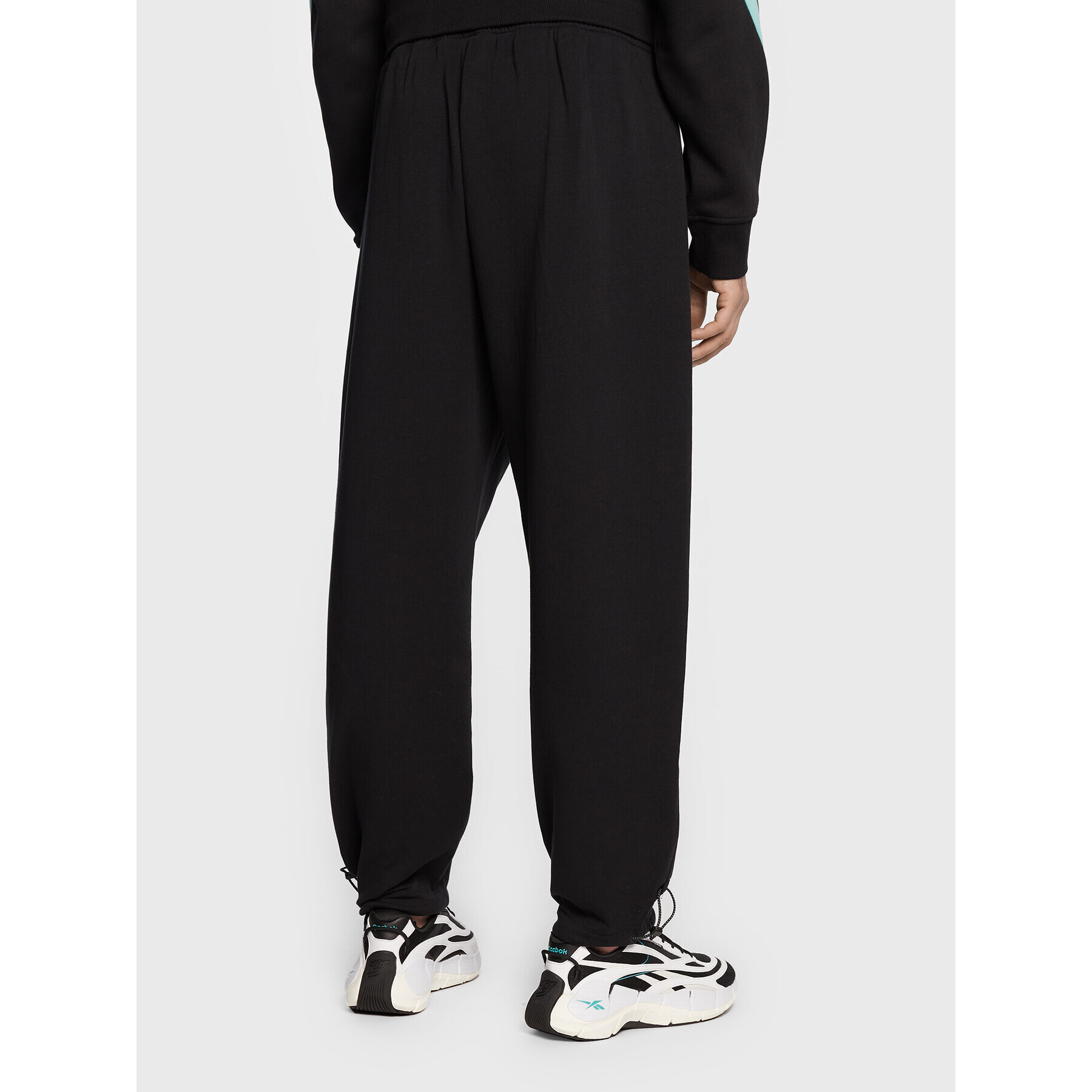 Reebok Долнище анцуг DreamBlend HG8906 Черен Loose Fit - Pepit.bg