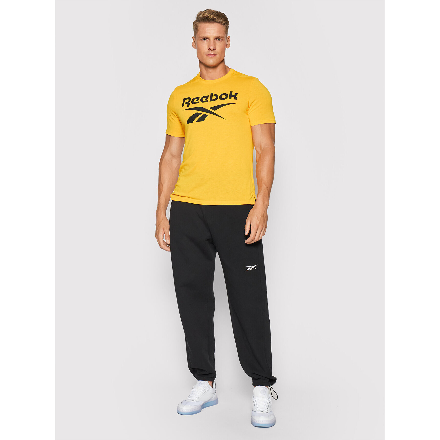 Reebok Долнище анцуг DreamBlend GL3125 Черен Relaxed Fit - Pepit.bg