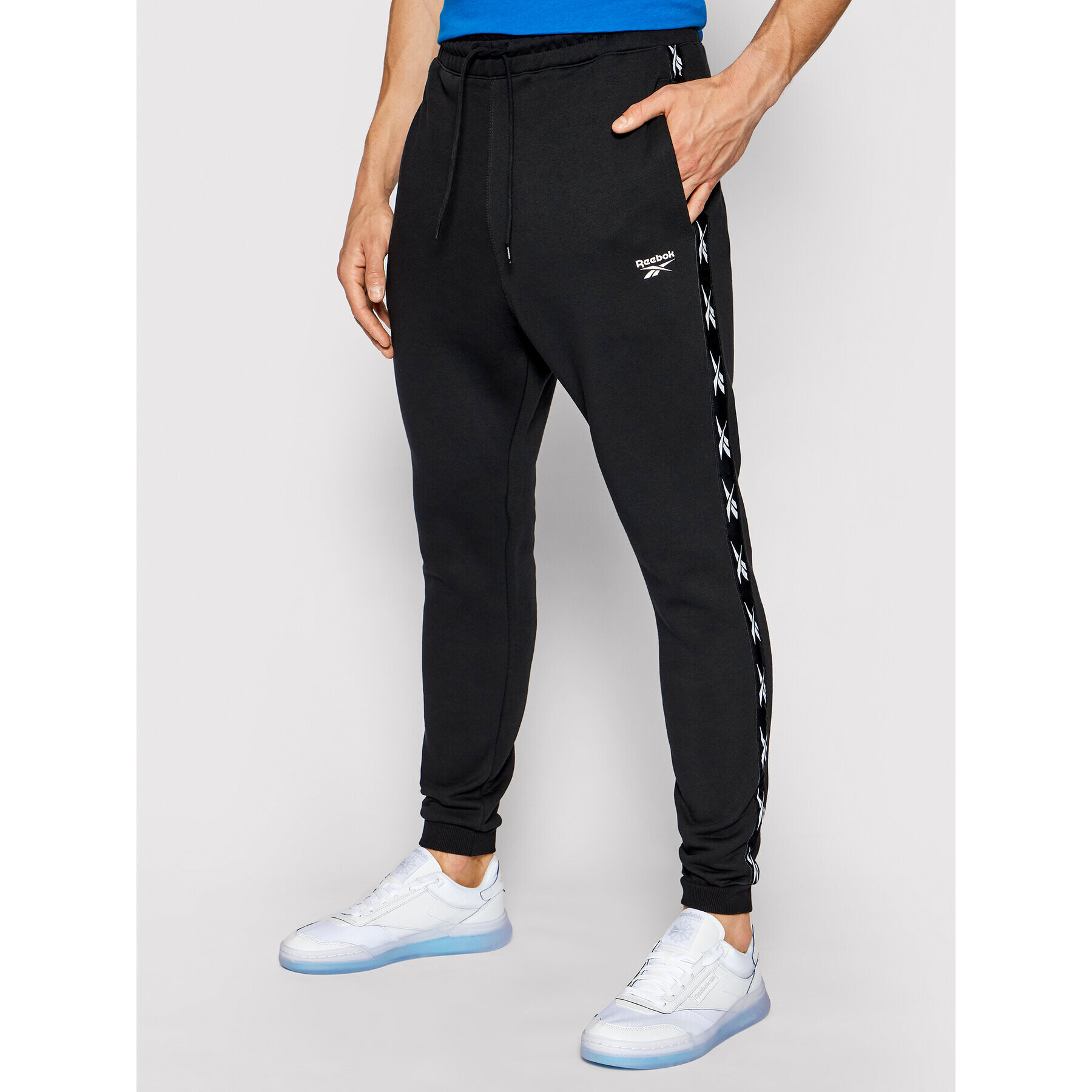 Reebok Долнище анцуг Essentials Tape GQ4215 Черен Regular Fit - Pepit.bg