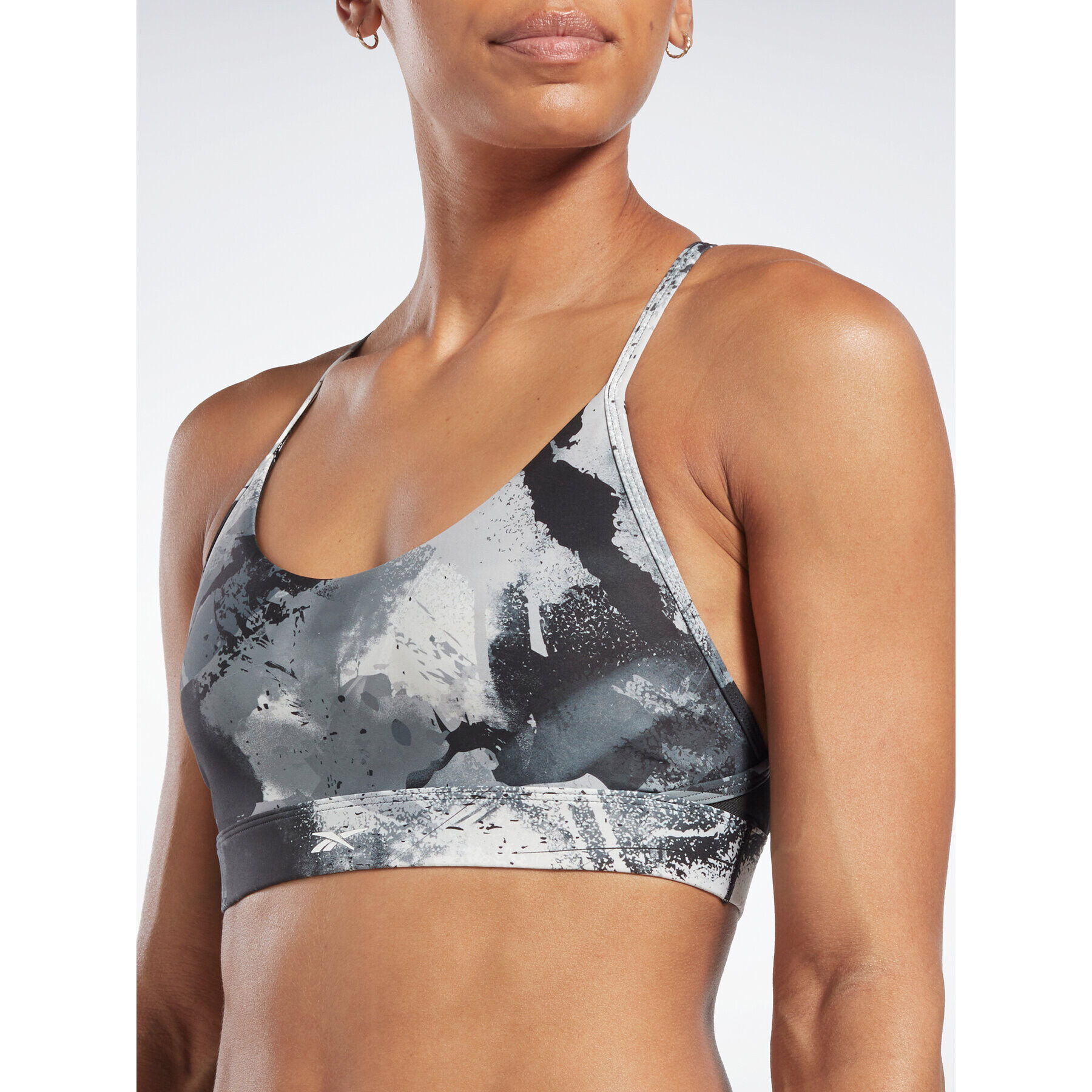 Reebok Спортен сутиен Lux Strappy Allover Print HS7793 Черен - Pepit.bg