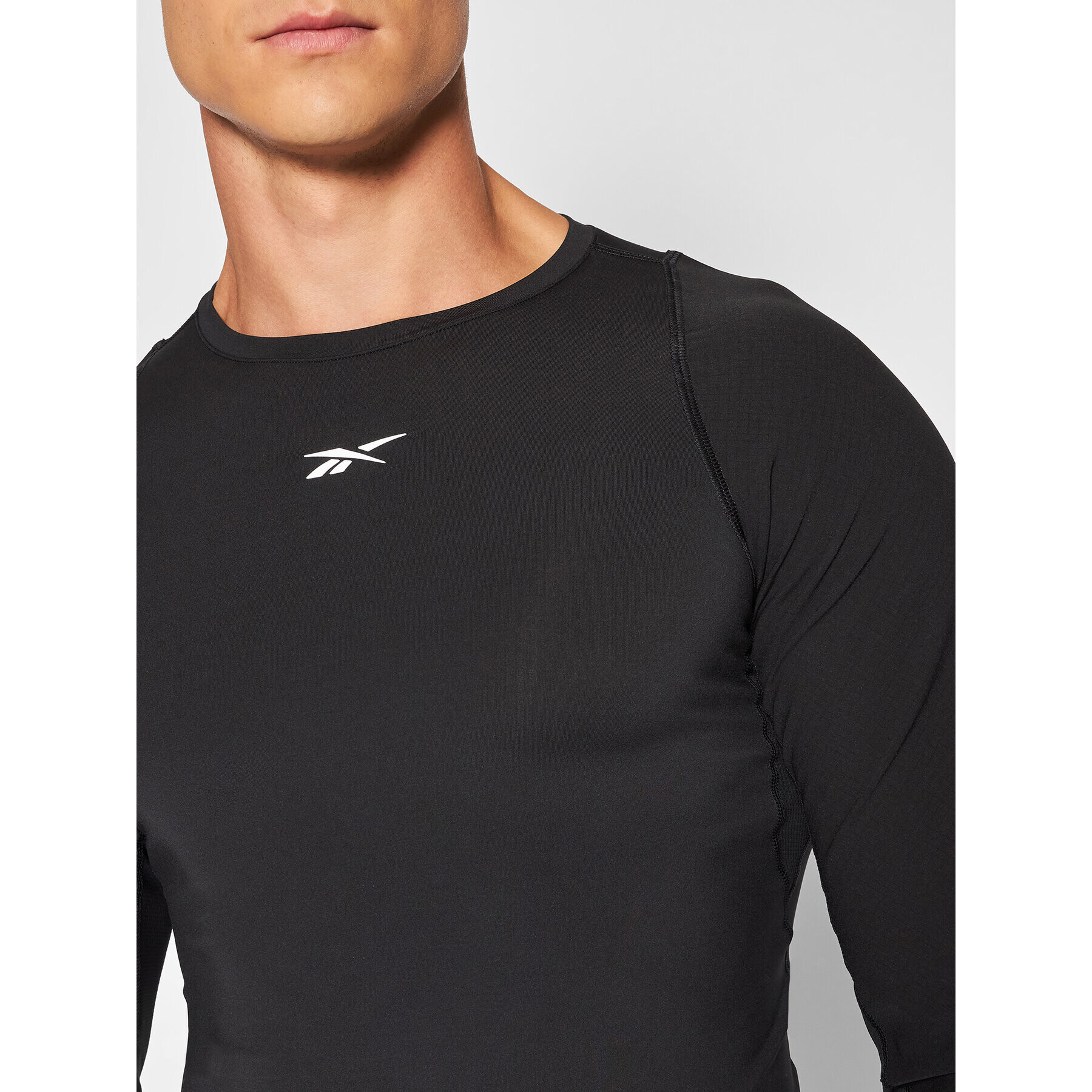 Reebok Тениска от техническо трико United By Fitness GT3225 Черен Compression Fit - Pepit.bg