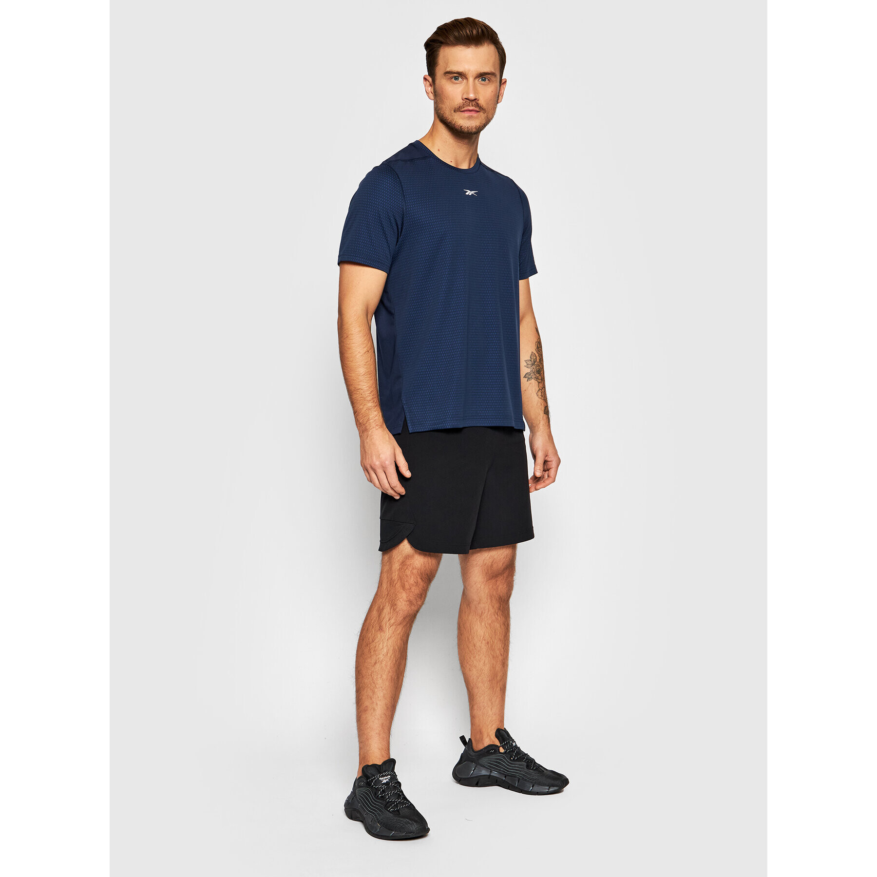 Reebok Тениска от техническо трико Sweatshift Move GN9098 Тъмносин Slim Fit - Pepit.bg