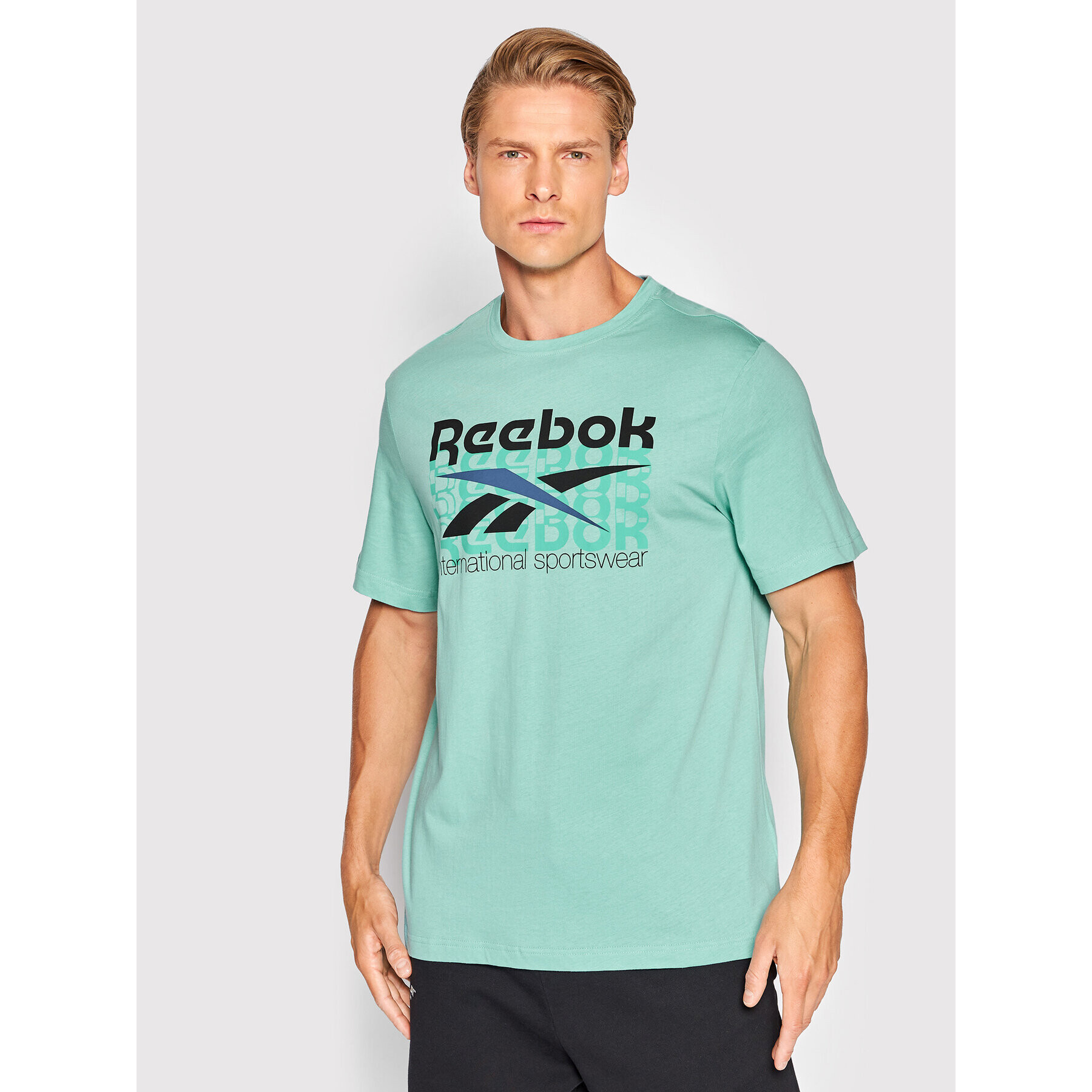 Reebok Тишърт International Sportswear HH7381 Син Regular Fit - Pepit.bg