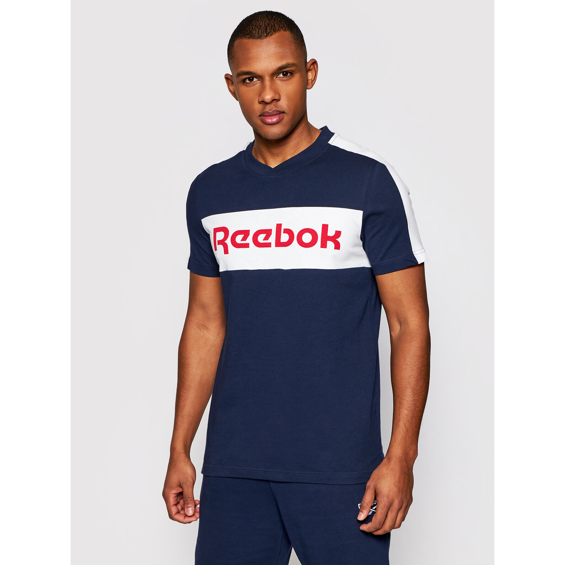 Reebok Тишърт Training Essentials Linear Logo Graphic GI8560 Тъмносин Slim Fit - Pepit.bg