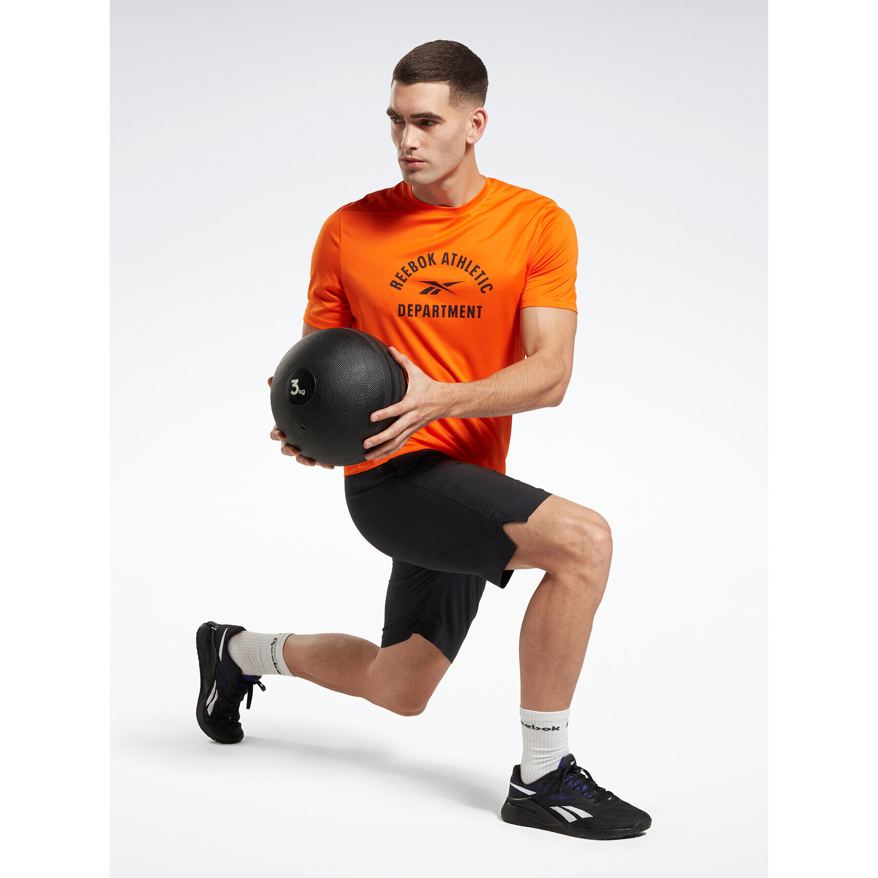 Reebok Тишърт Training Graphic IC7665 Оранжев Active Fit - Pepit.bg
