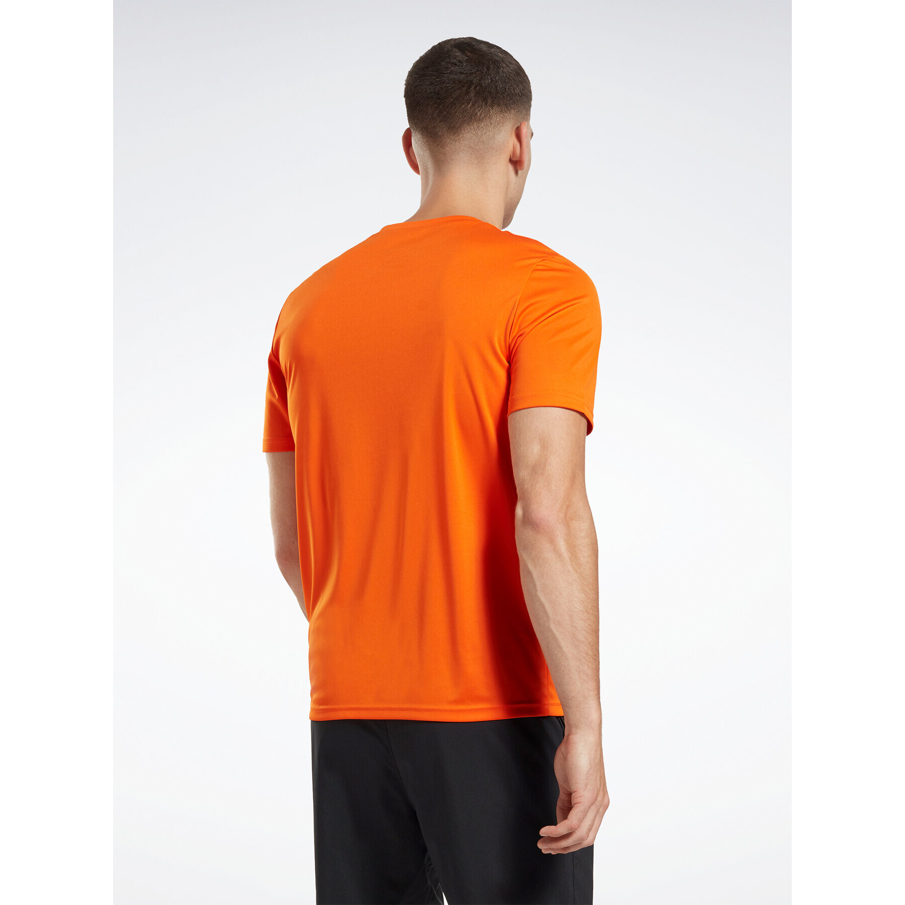 Reebok Тишърт Training Graphic IC7665 Оранжев Active Fit - Pepit.bg