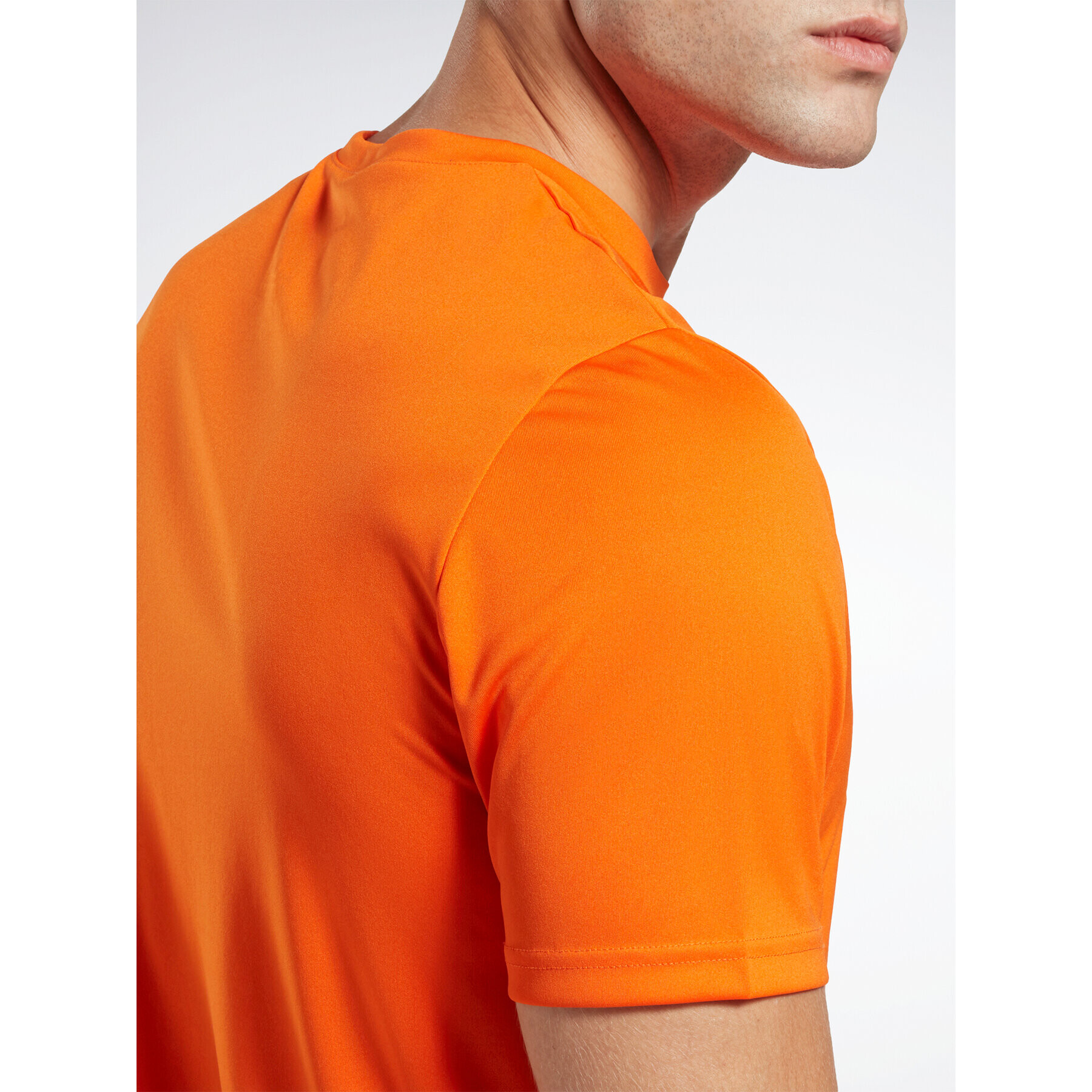 Reebok Тишърт Training Graphic IC7665 Оранжев Active Fit - Pepit.bg