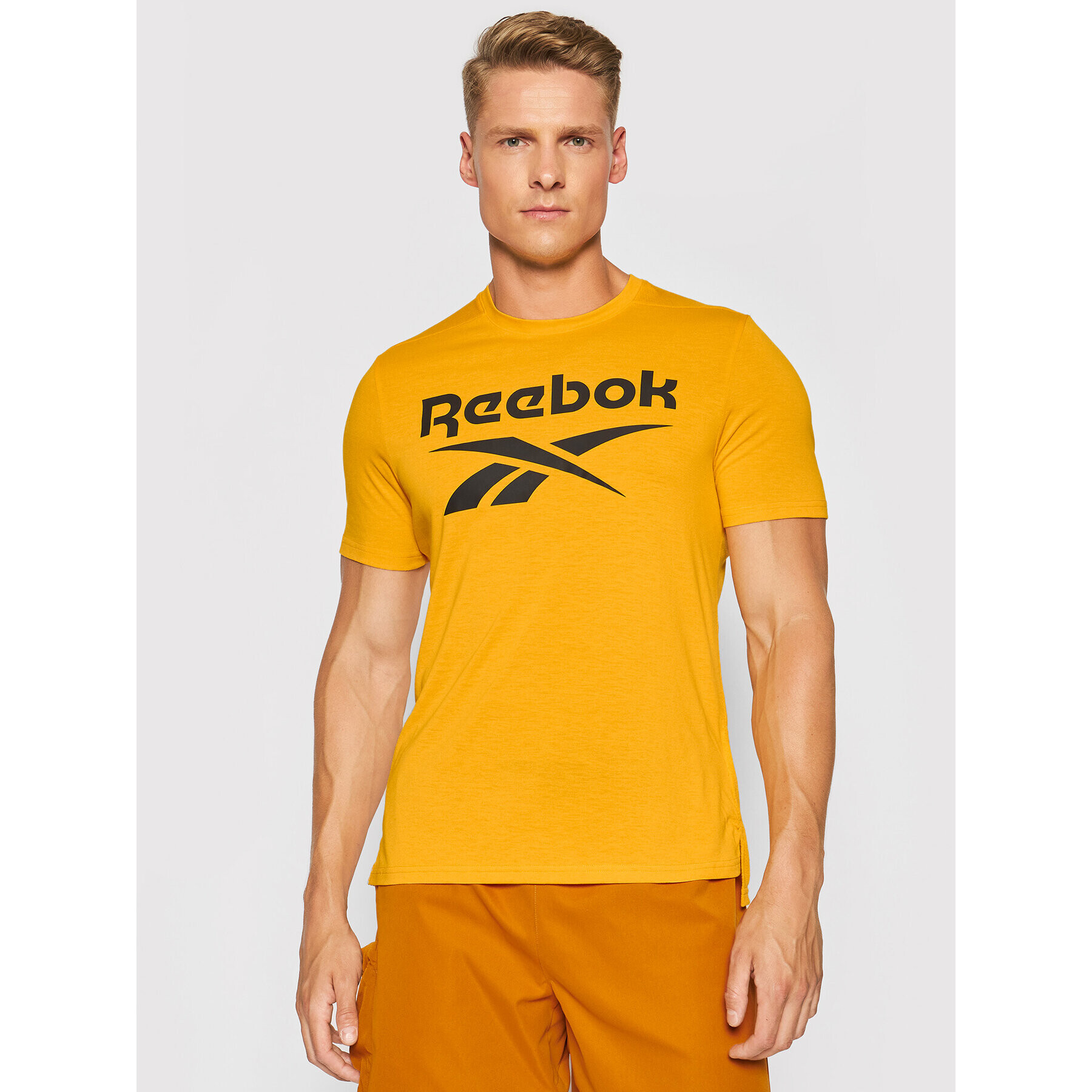 Reebok Тишърт Workout Ready Supremium Graphic GT5759 Оранжев Regular Fit - Pepit.bg