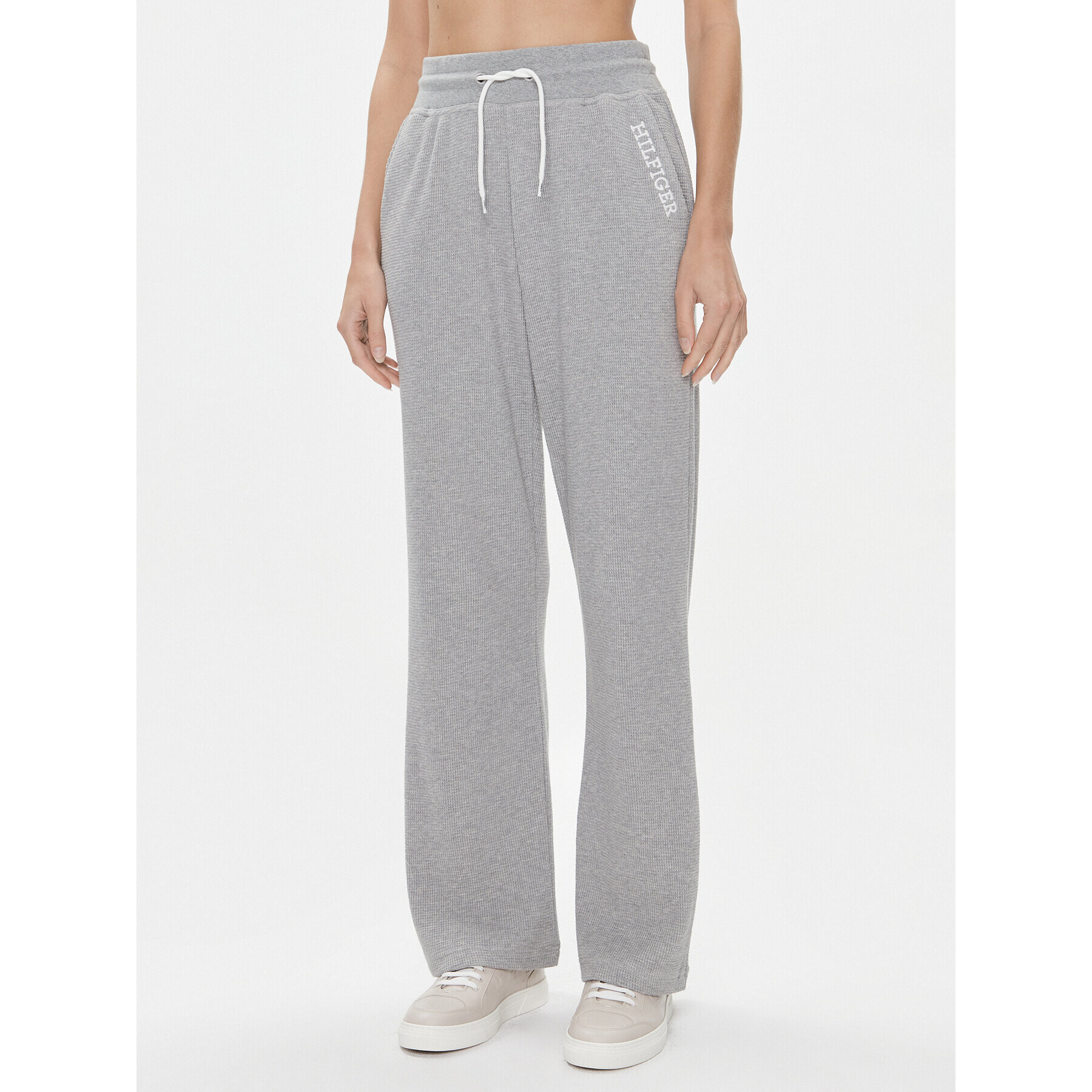 Tommy Hilfiger Долнище анцуг UW0UW04946 Сив Relaxed Fit - Pepit.bg