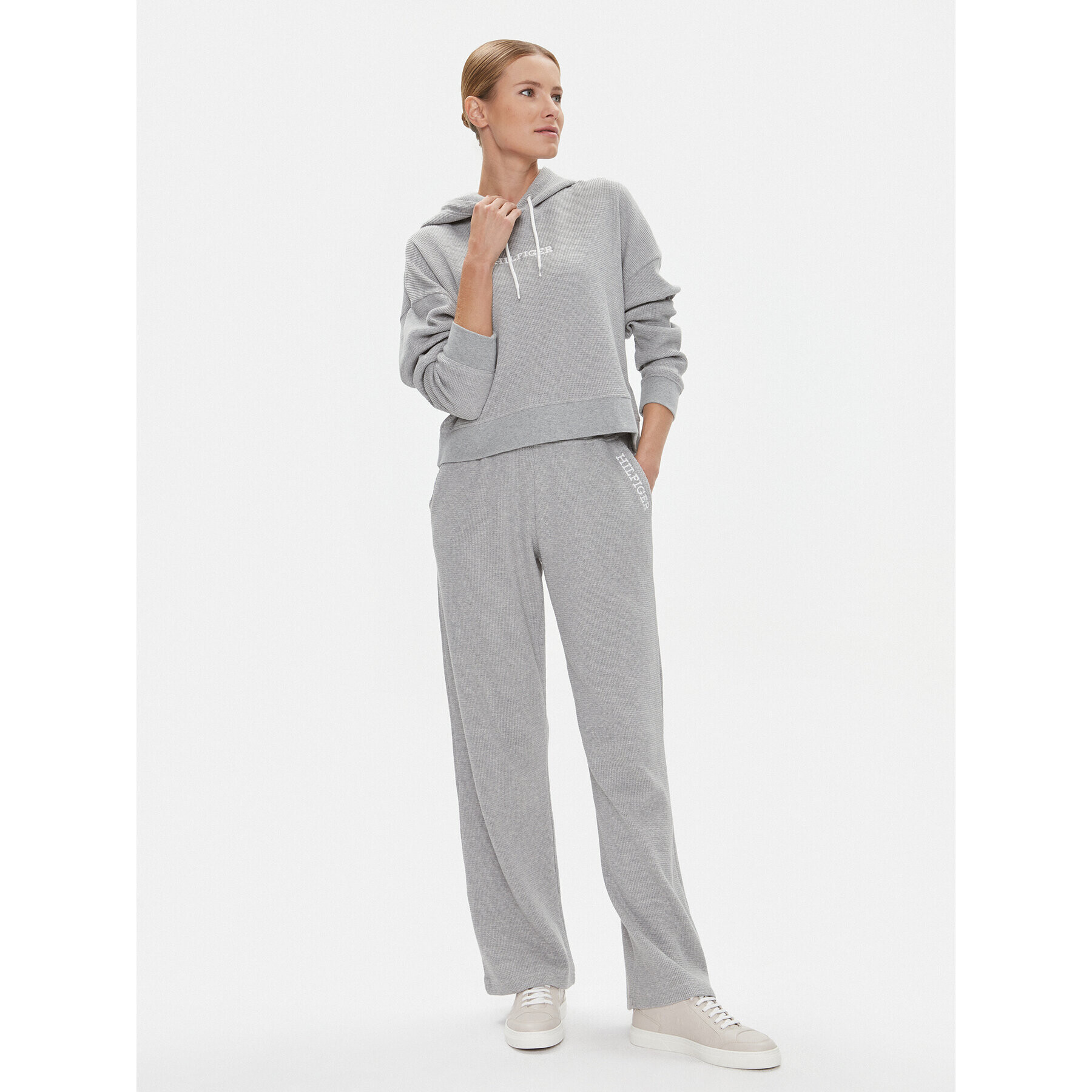 Tommy Hilfiger Долнище анцуг UW0UW04946 Сив Relaxed Fit - Pepit.bg