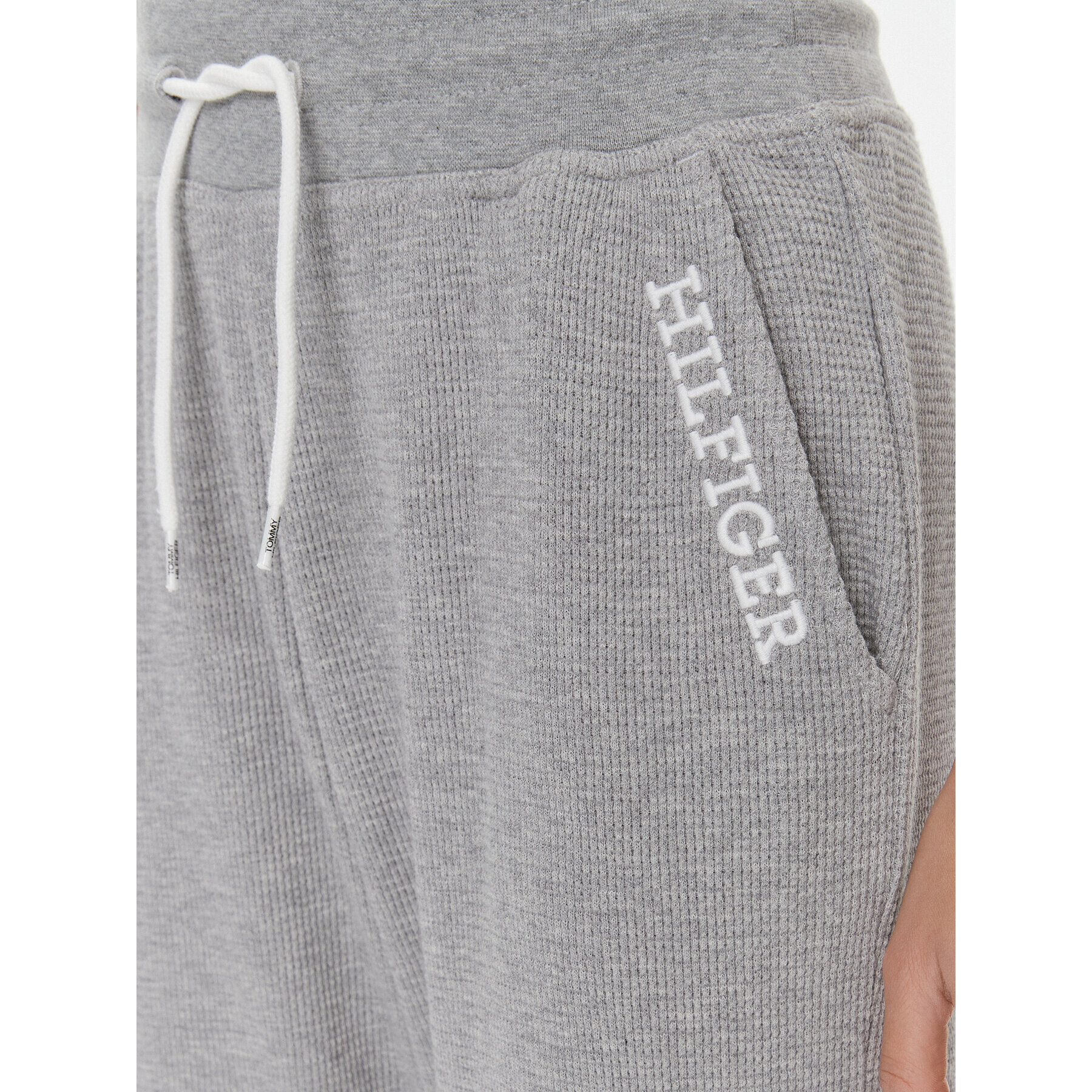 Tommy Hilfiger Долнище анцуг UW0UW04946 Сив Relaxed Fit - Pepit.bg