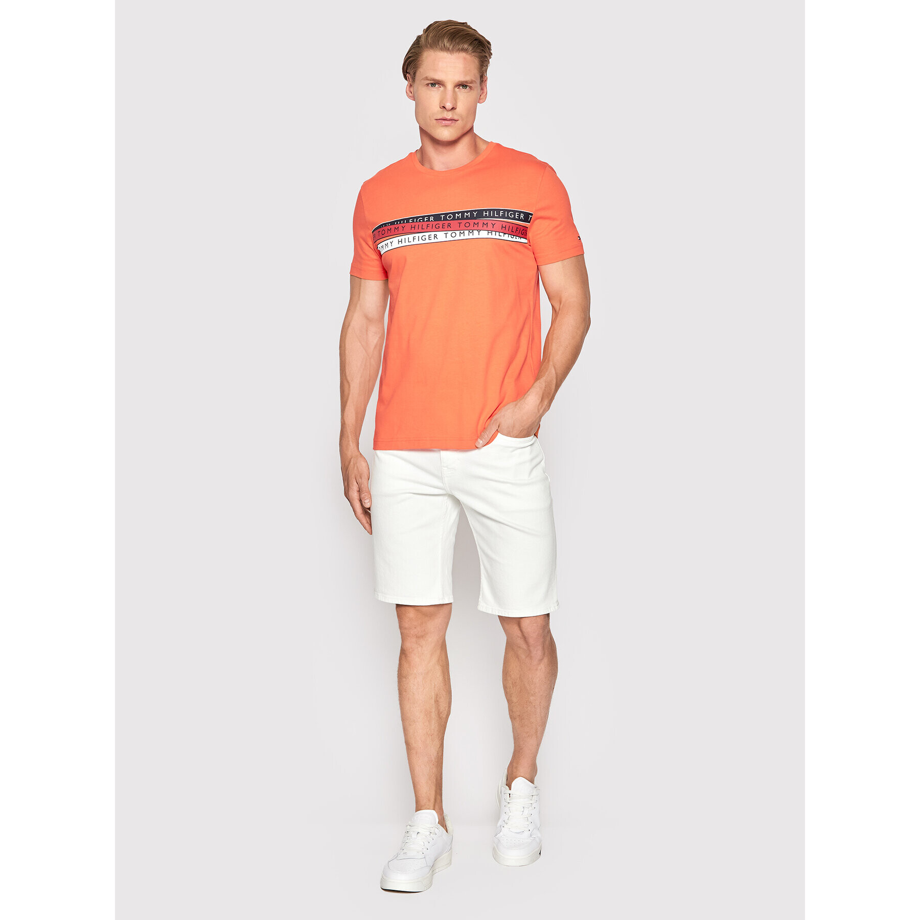 Tommy Hilfiger Тишърт Corp Chest Taping MW0MW24549 Оранжев Regular Fit - Pepit.bg