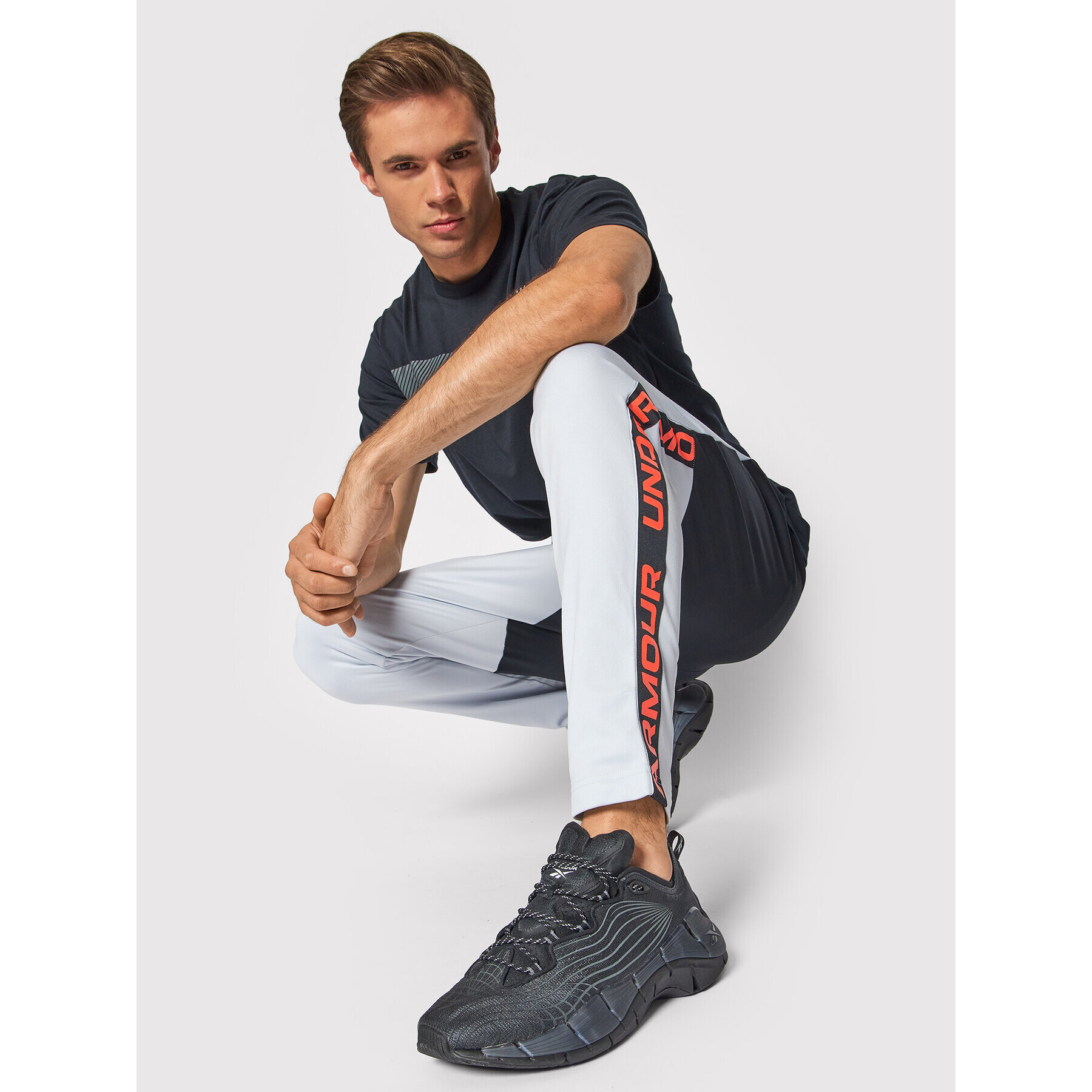 Under Armour Долнище анцуг Ua Tricot Track 1366209 Сив Loose Fit - Pepit.bg