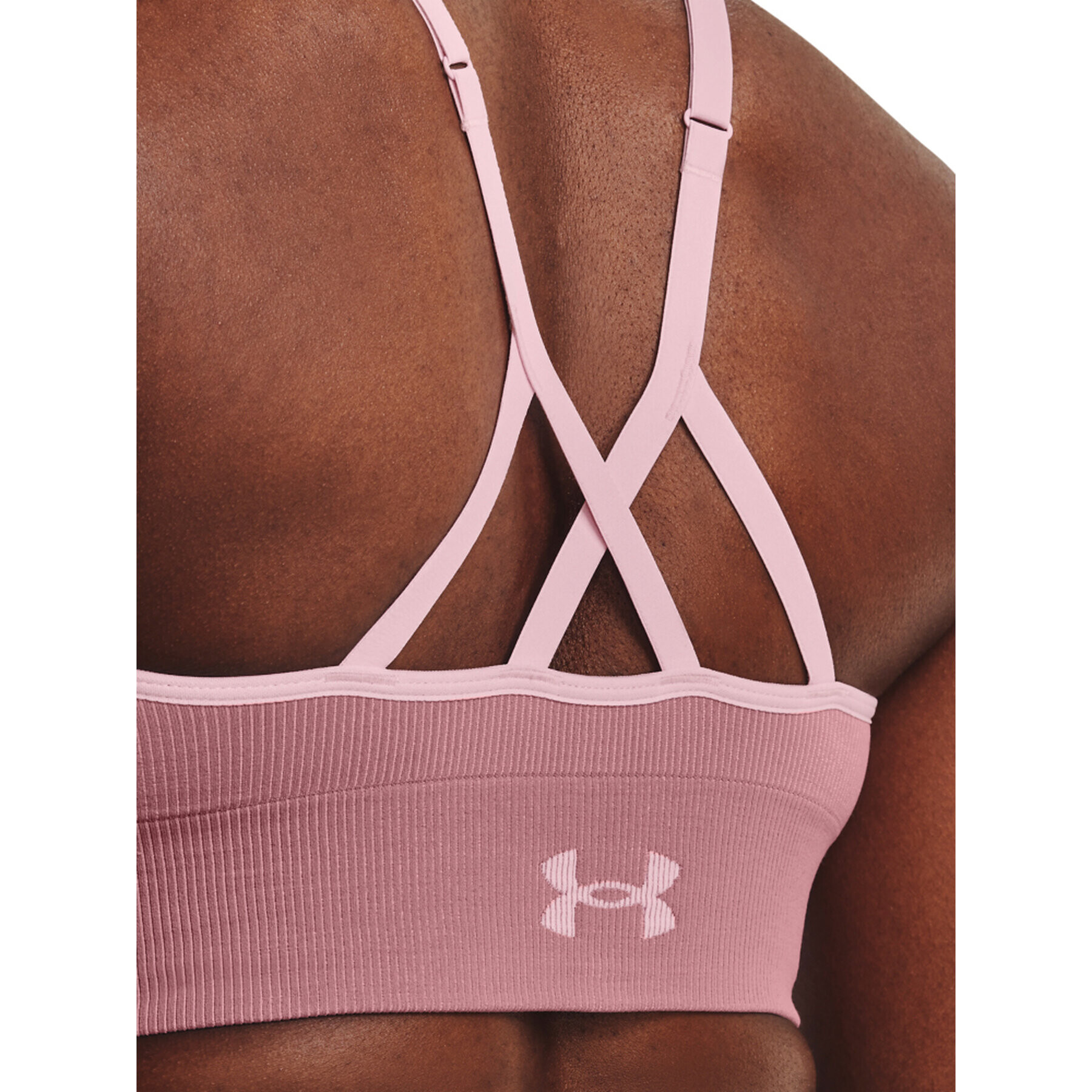 Under Armour Спортен сутиен UA Seamless Low Long Rib 1373870 Розов - Pepit.bg