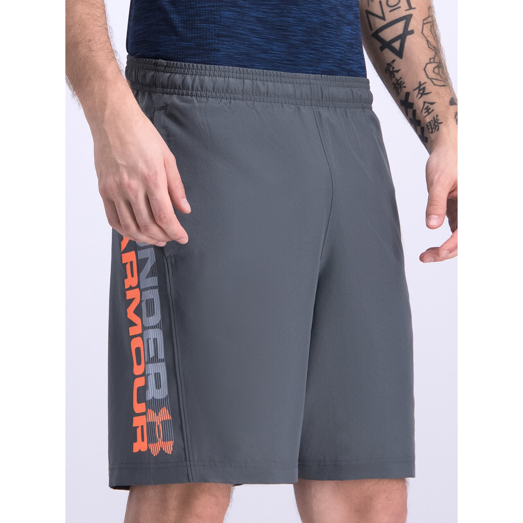 Under Armour Спортни шорти UA Woven Graphic Wordmark 1320203 Сив Regular Fit - Pepit.bg