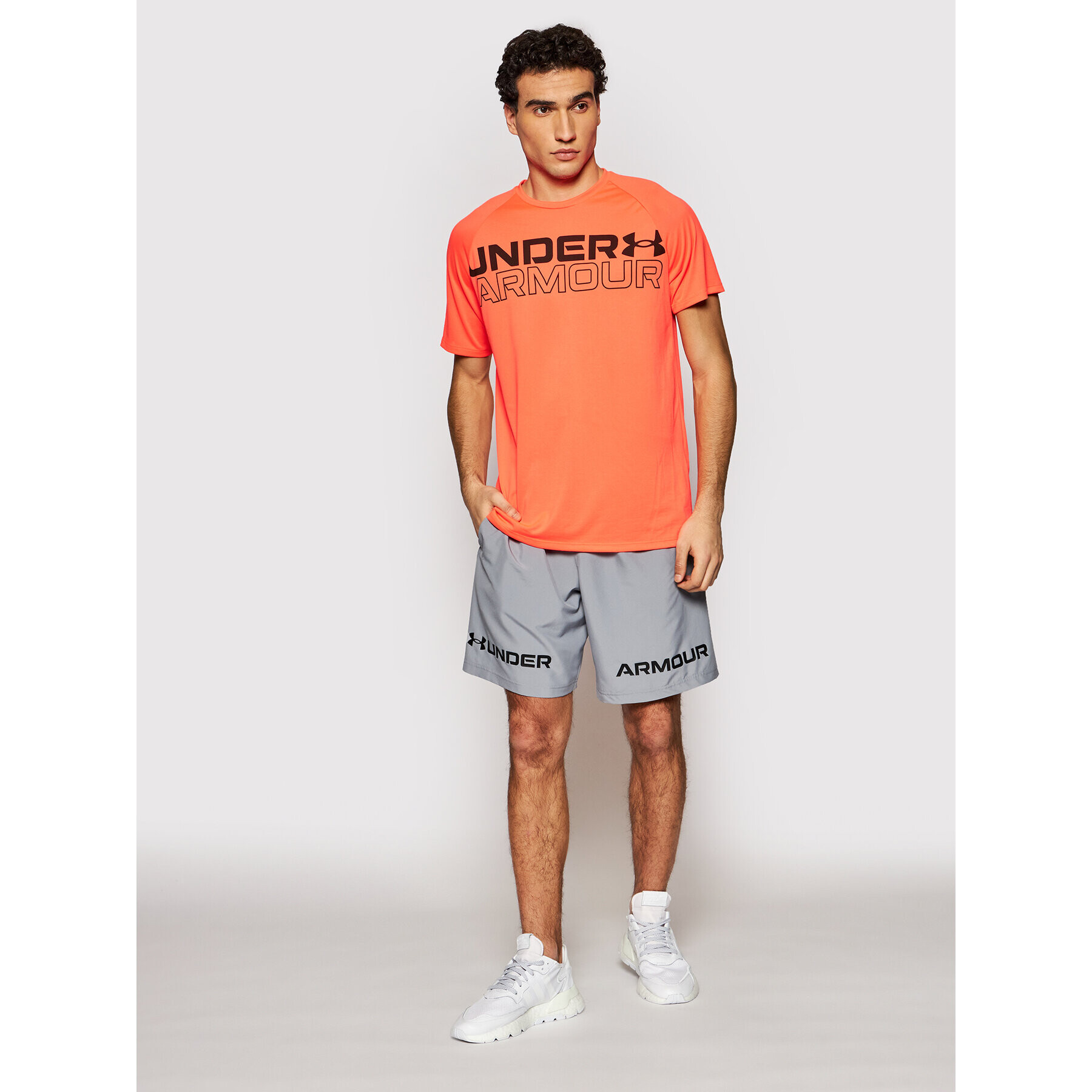 Under Armour Тениска от техническо трико Wordmark 1361702 Оранжев Loose Fit - Pepit.bg