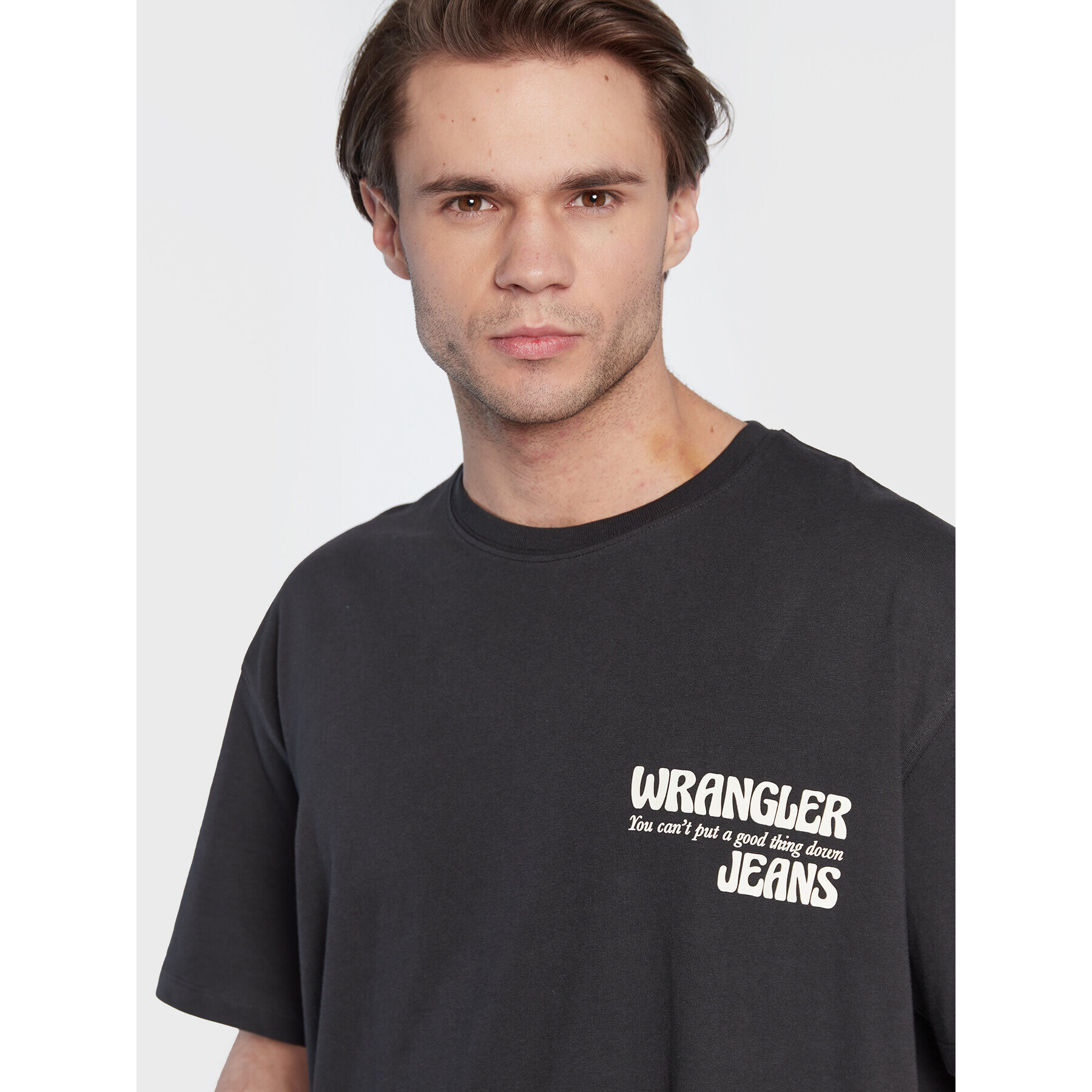 Wrangler Тишърт Slogan W70NEEXV6 112321205 Черен Relaxed Fit - Pepit.bg