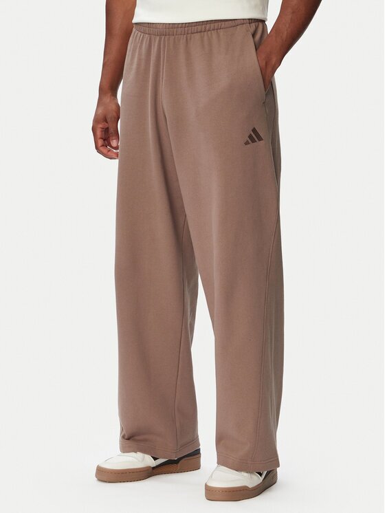 adidas Долнище анцуг Kit Small Logo Wide KW2339 Relaxed Fit